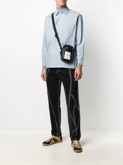 Xander Zhou asymmetric button patch pocket shirt outlook