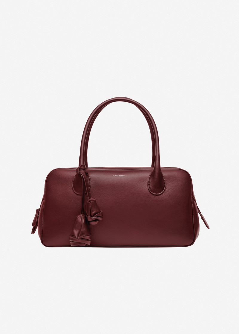 Brigitte in burgundy leather with flower charm 1