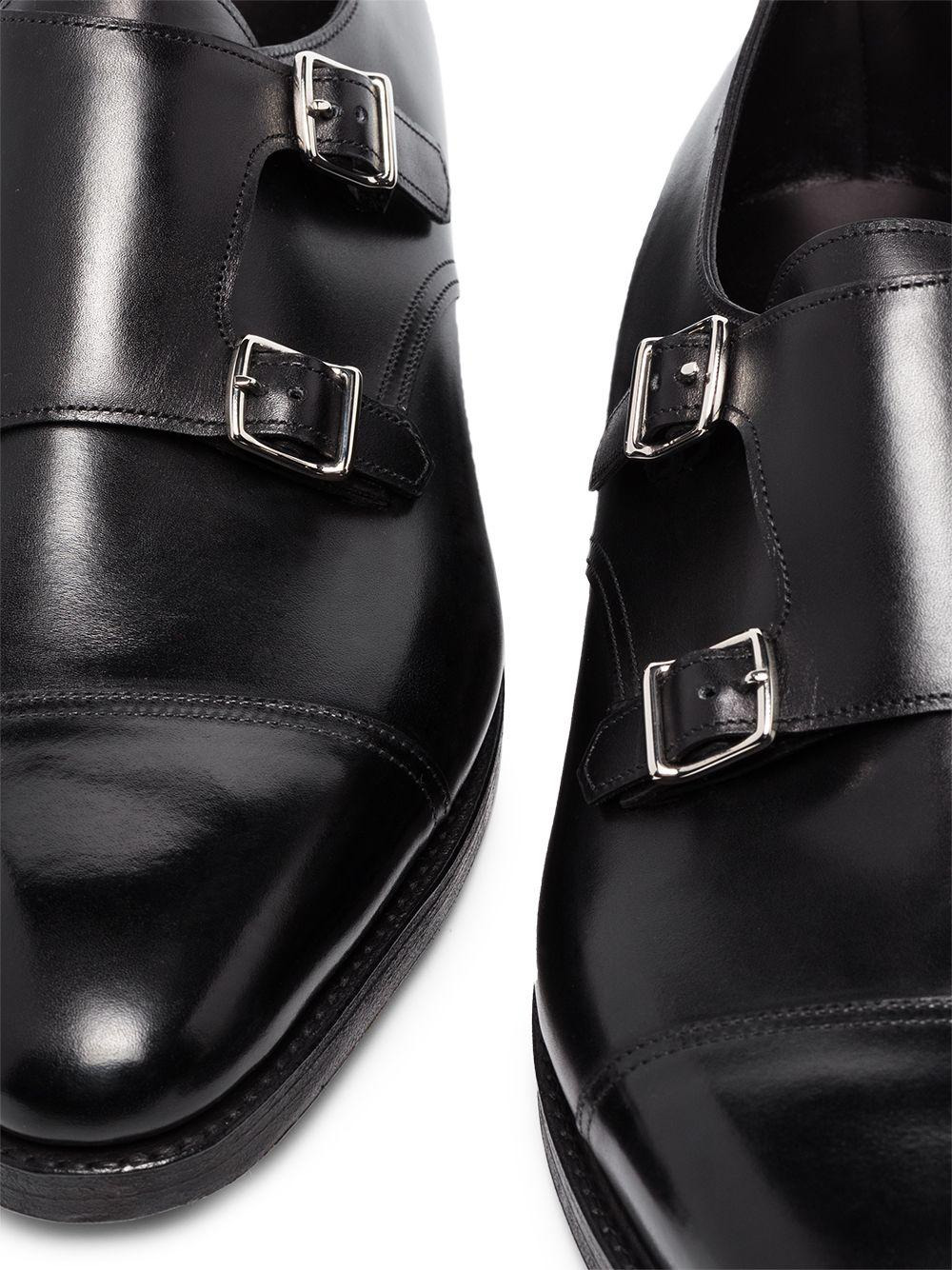 William lace-up in smooth black leather with double palladium finish buckle and double leather sole. - 2