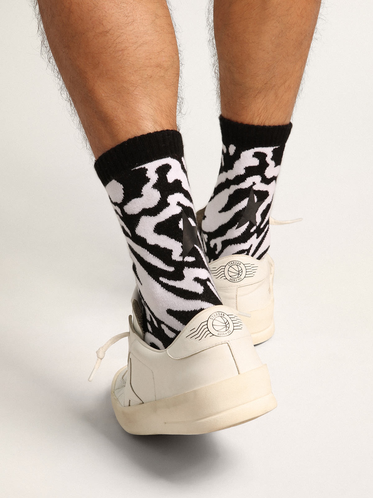 Black and white socks with leopard print and black star on the back - 4