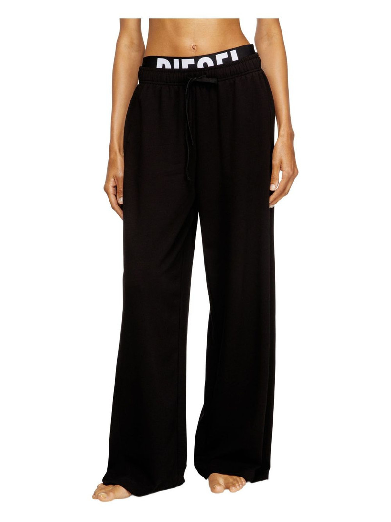 Leslie-D-Pop logo-print trousers 3