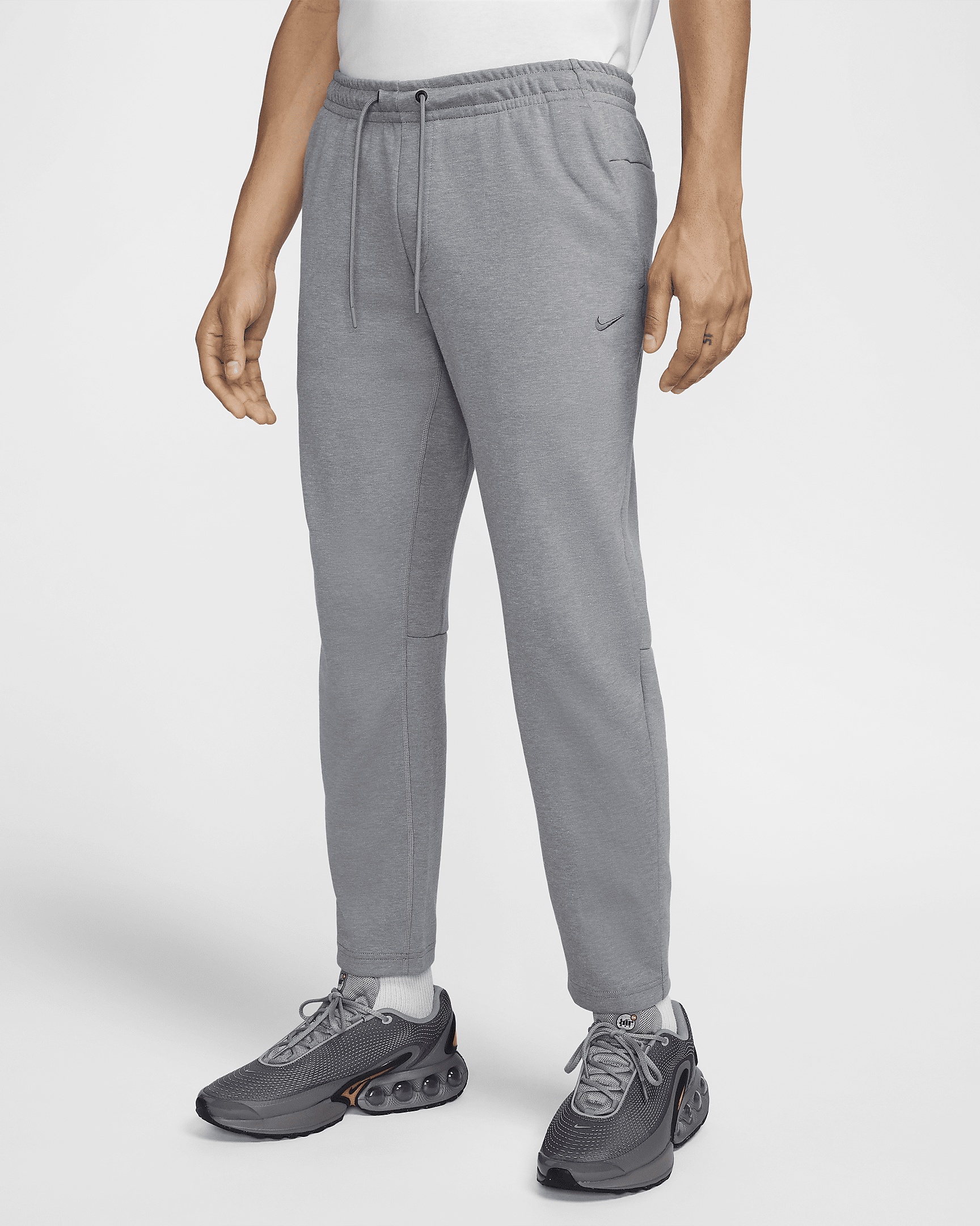 Nike Primary Men's Dri-FIT UV Tapered Versatile Pants - 1