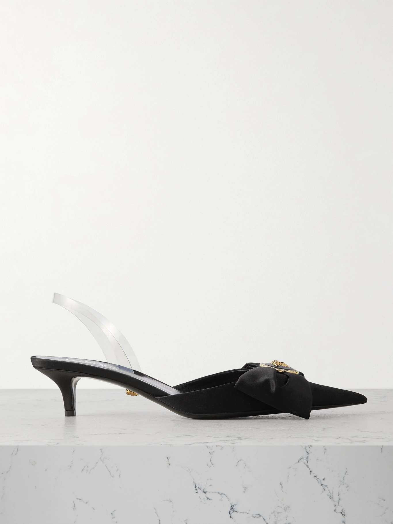 Medusa bow embellished rubber-trimmed satin slingback pumps - 1