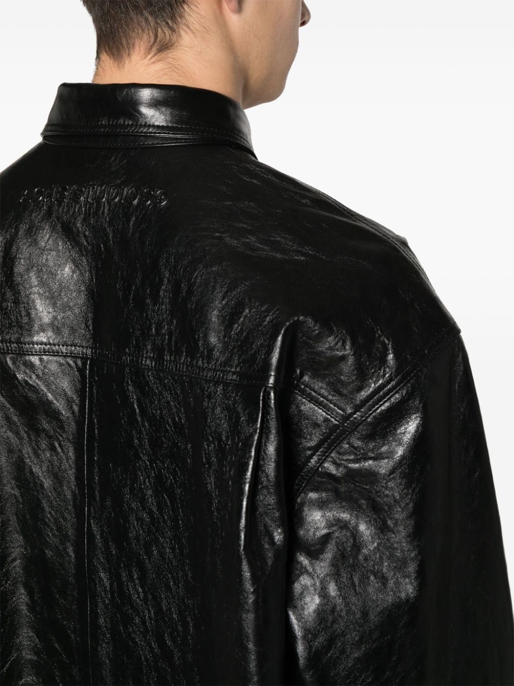 logo-embossed leather coat