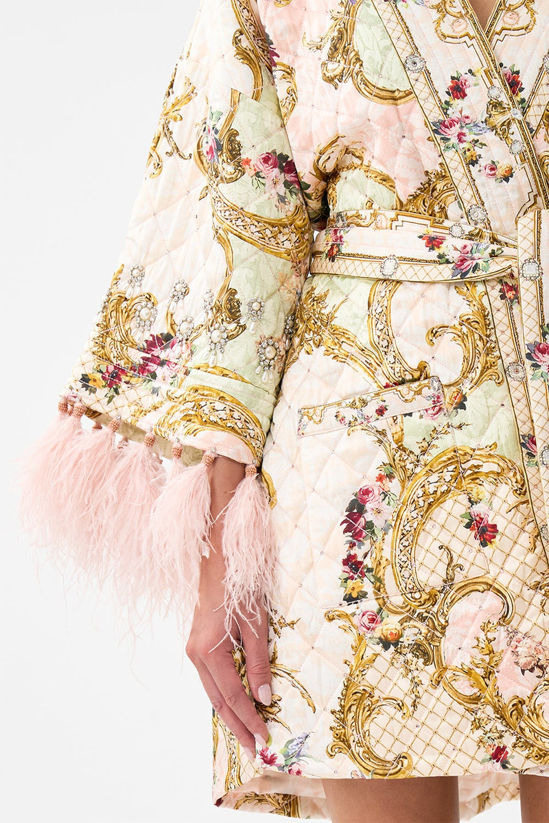 LAYER WITH TIE BELT AND FEATHERS 6