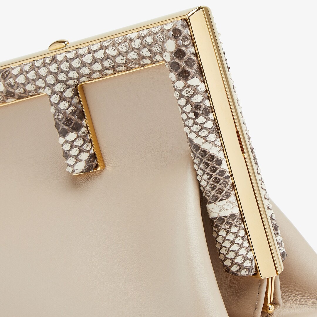 Small Fendi First bag made of soft pink nappa leather with oversized metal F clasp bound in tone-on- - 5