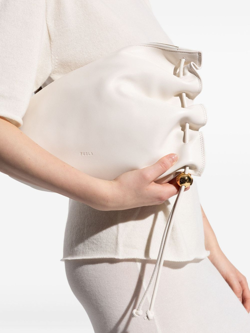 FURLA drawstring-detail leather clucth bag outlook