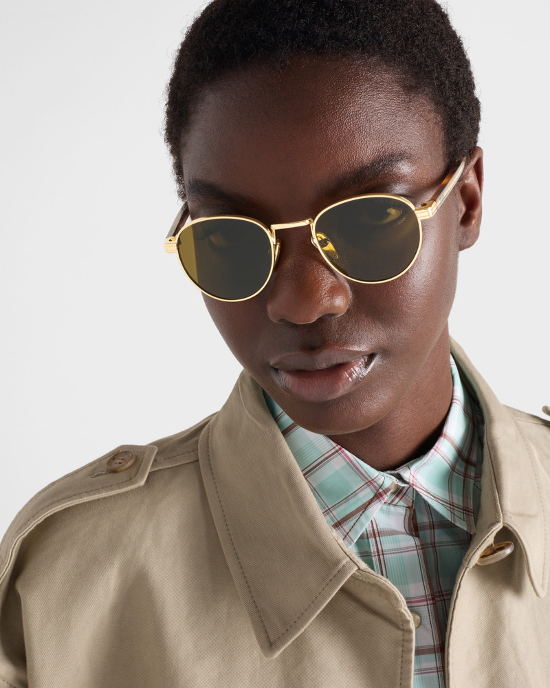 Prada Sunglasses with the iconic metal plaque outlook