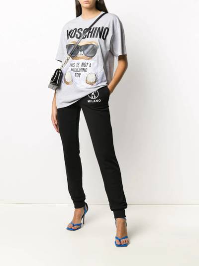 Moschino Milano logo-print track pants outlook