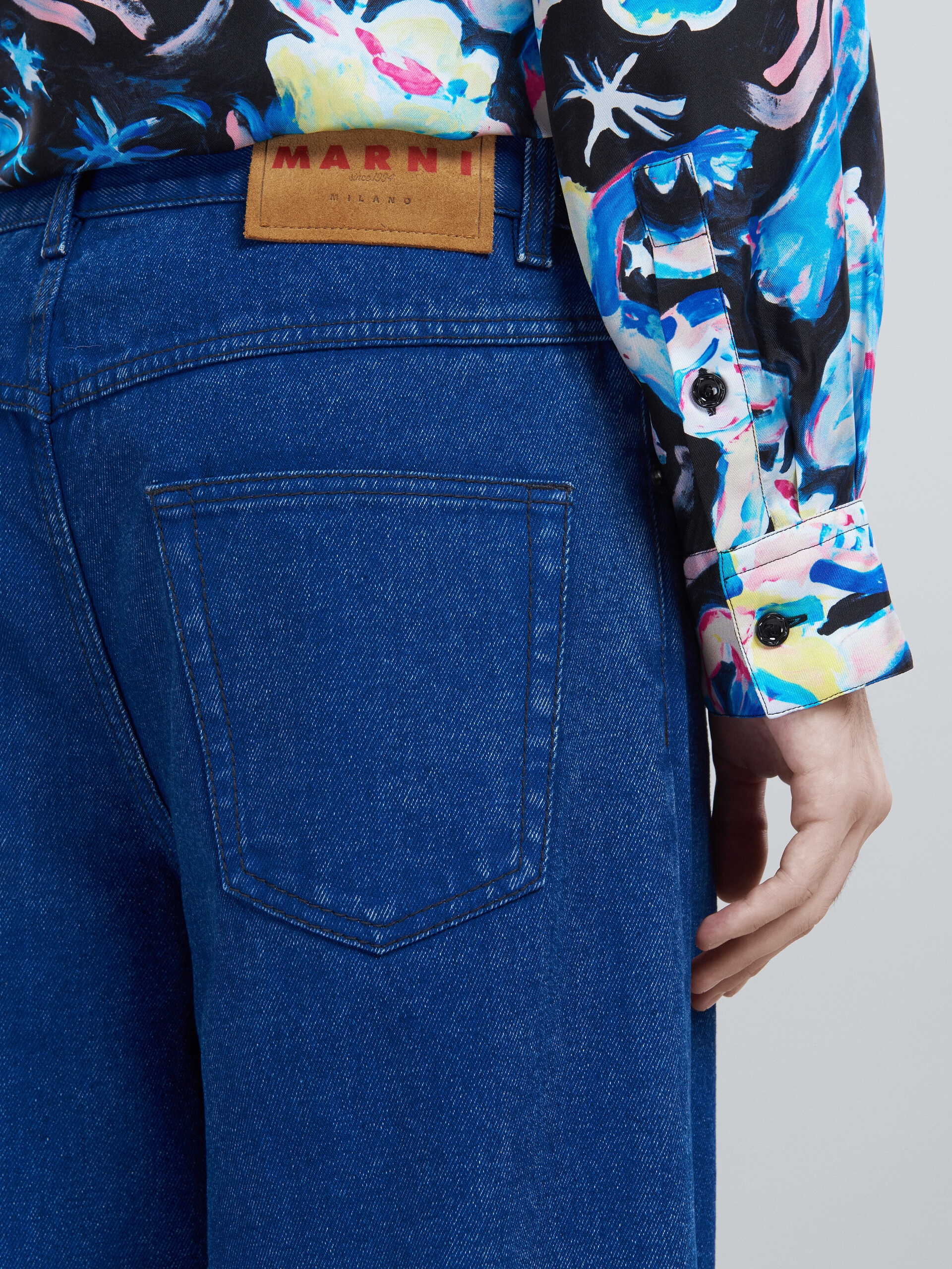 FLARED TROUSERS IN COATED BLUE DENIM - 4