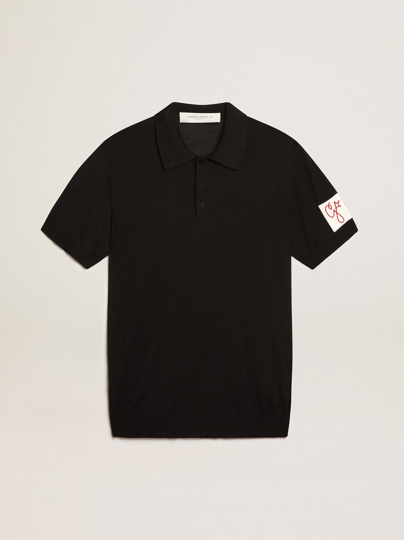 Men’s short-sleeved polo shirt in black merino wool - 1