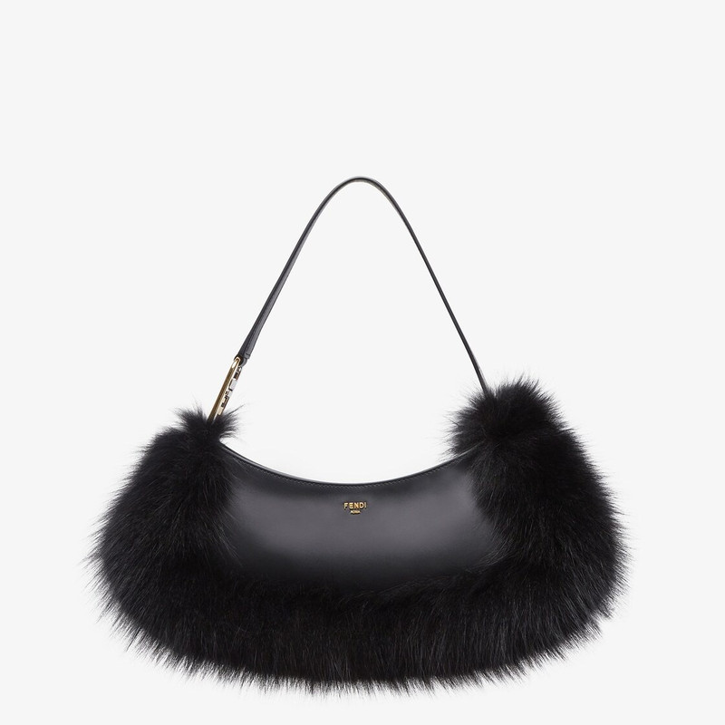 Pouch made of black leather, embellished with tone on tone fox fur and decorated with Fendi Roma let 1
