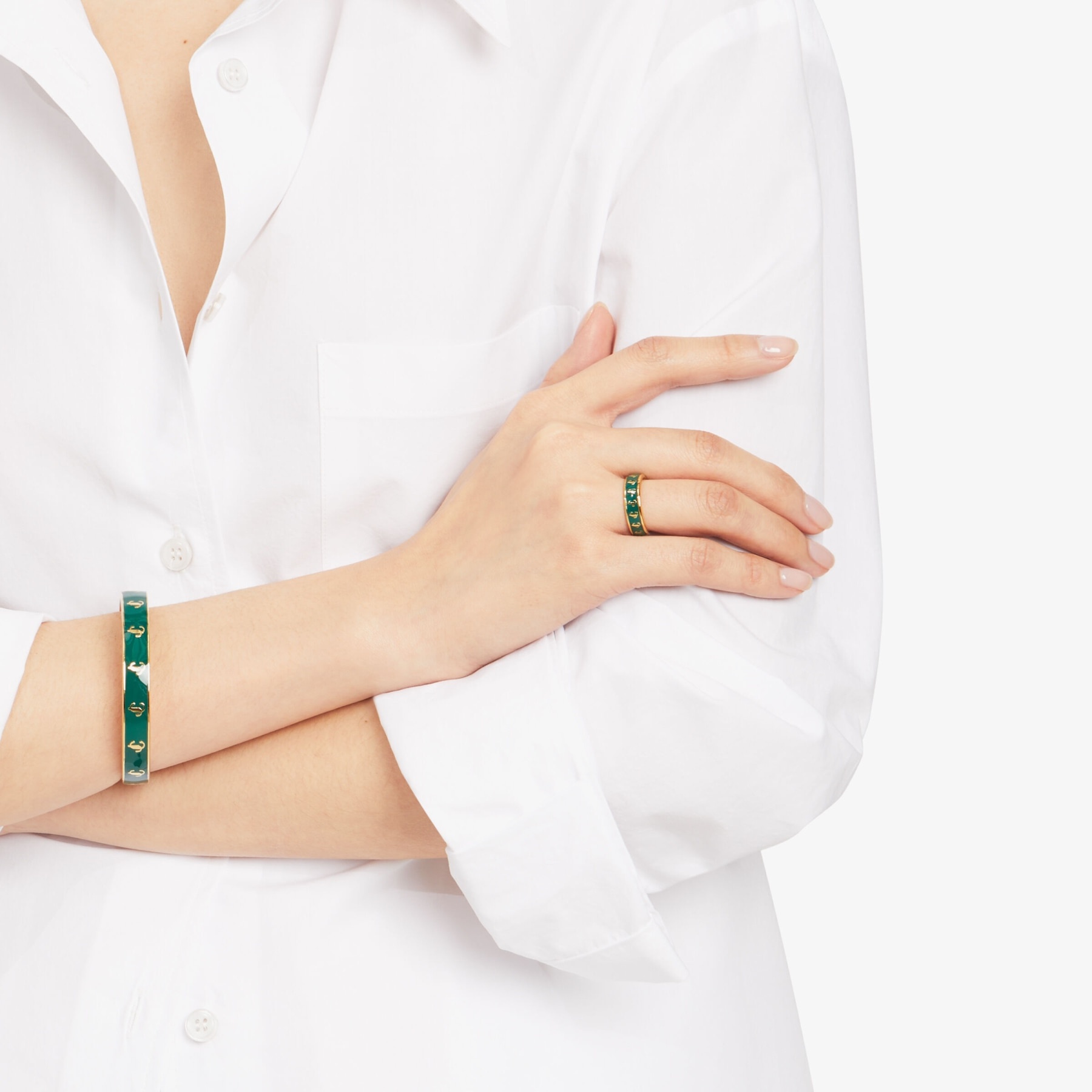 JC Enamel Ring
Gold-Finish Metal and Emerald Enamel JC Ring - 2