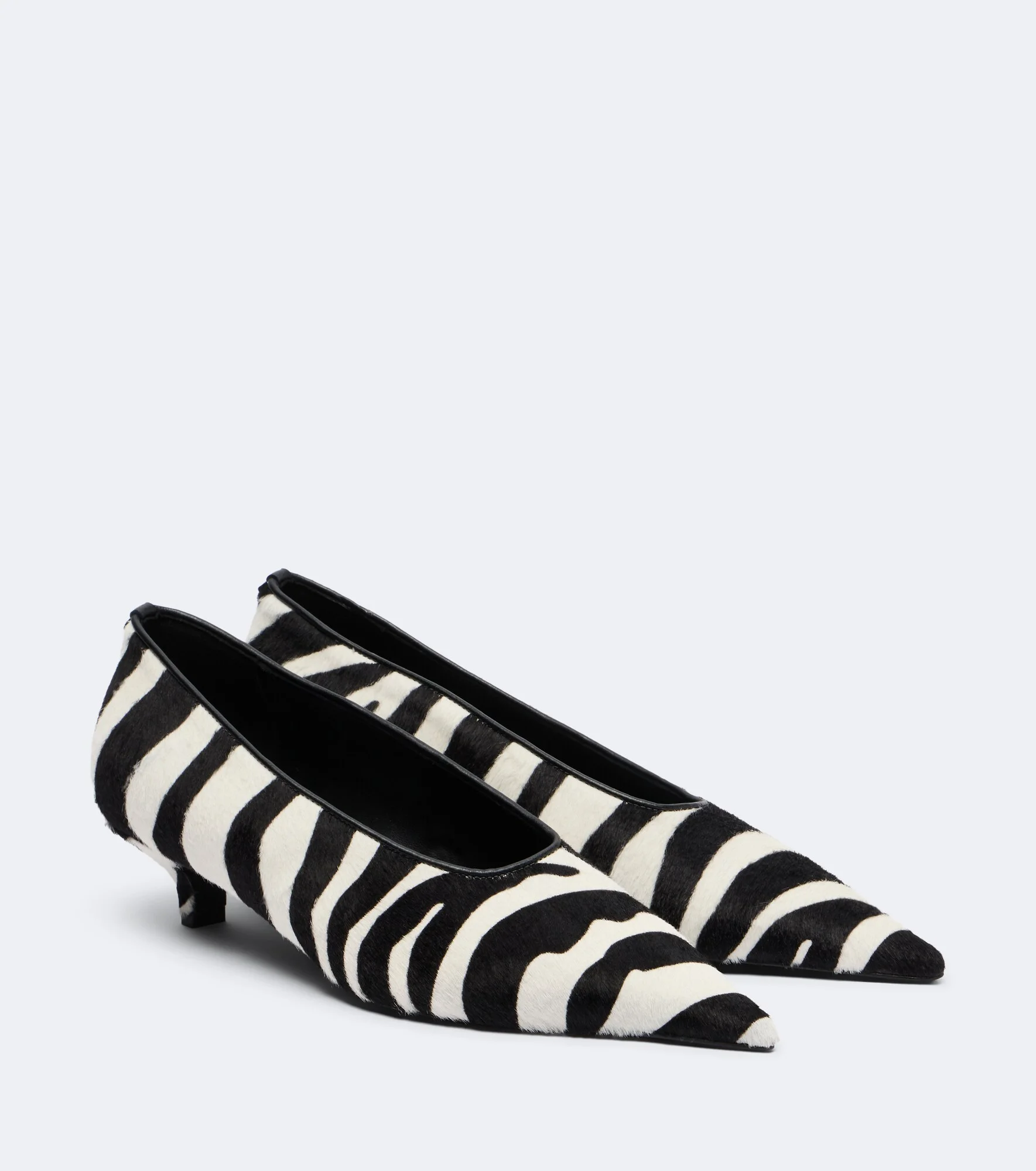 Zebra-print calf hair pumps - 1