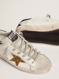 Golden Goose Super-Star sneakers with gold star and glittery black
