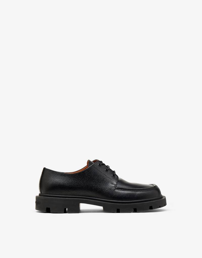 Cleated sole shoes 1