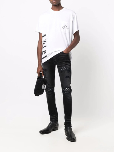 AMIRI x Playboy skinny jeans outlook