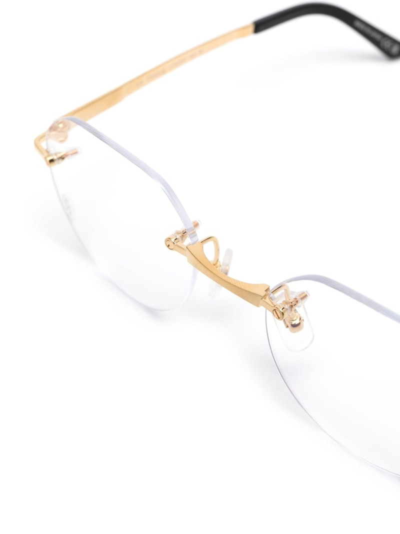 Santos de Cartier rimless glasses 3