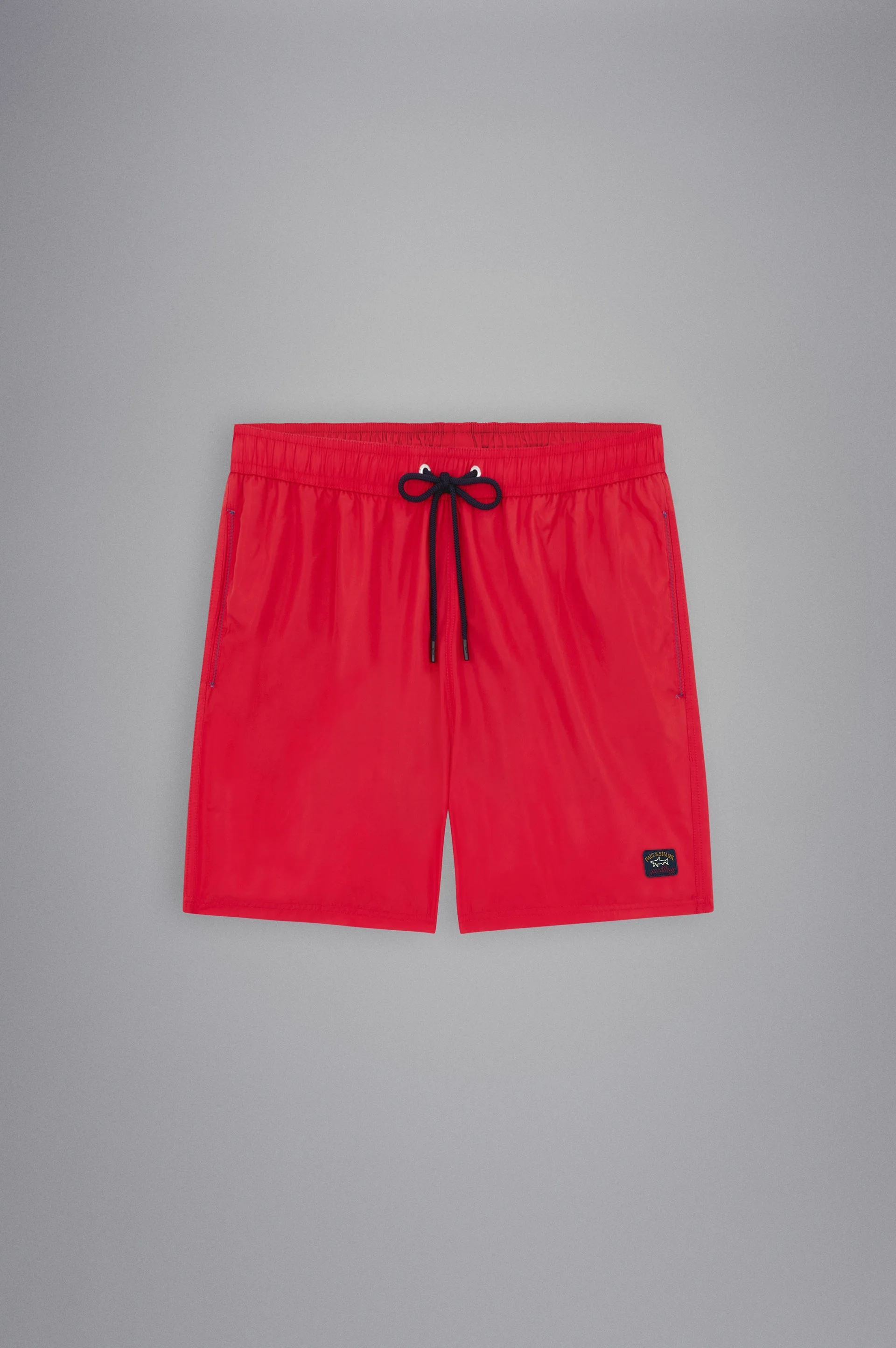 SWIM SHORTS WITH ICONIC BADGE - 1