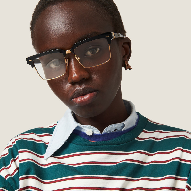 Miu Miu Leather and metal earrings outlook