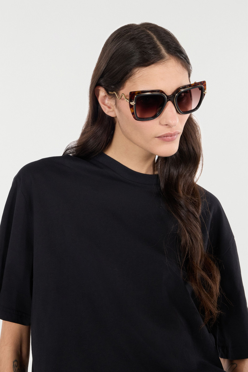 Roberto Cavalli Wide and feminine front sunglasses with double ring decoration outlook
