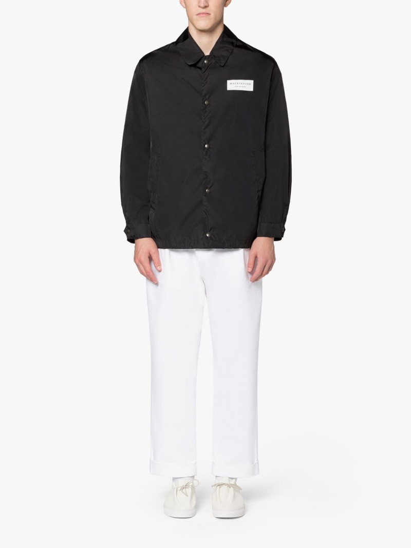 TEEMING BLACK NYLON PACKABLE COACH JACKET 1