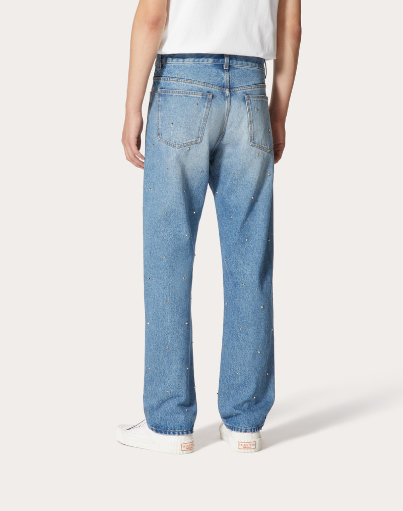 DENIM PANTS WITH ALL-OVER ROCKSTUD SPIKE STUDS 4
