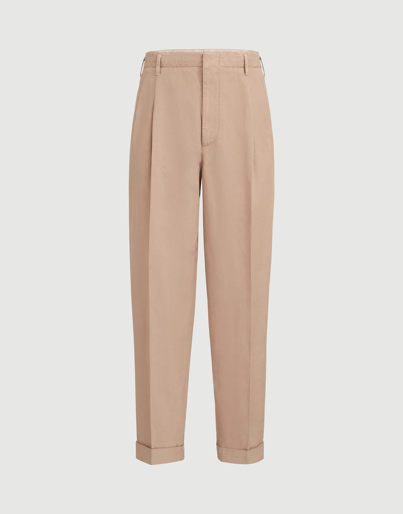 Garment-dyed trousers in cotton and linen canvas with double pleats 1