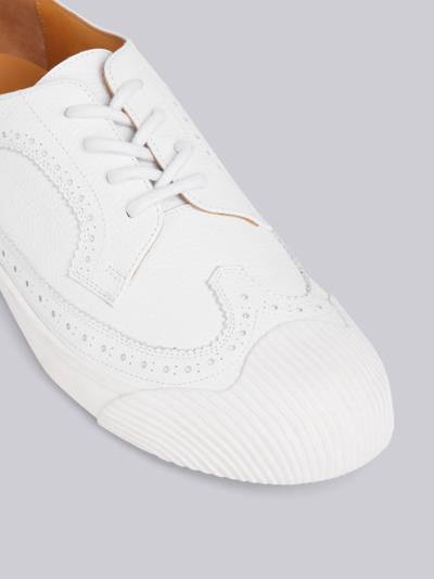 Thom Browne White Pebbled Calfskin Longwing Brogue Trainer outlook