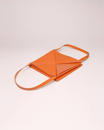 Nanushka THE ORIGAMI TOTE - Patent vegan leather tote - Orange outlook