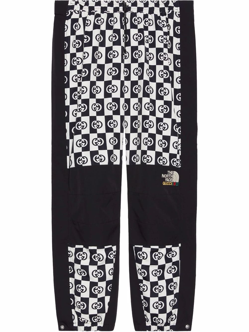 x The North Face monogram print track pants - 1