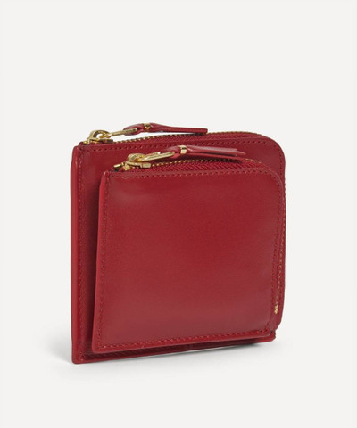 Comme Des Garçons Outside Pocket Line Zip Around Leather Wallet outlook