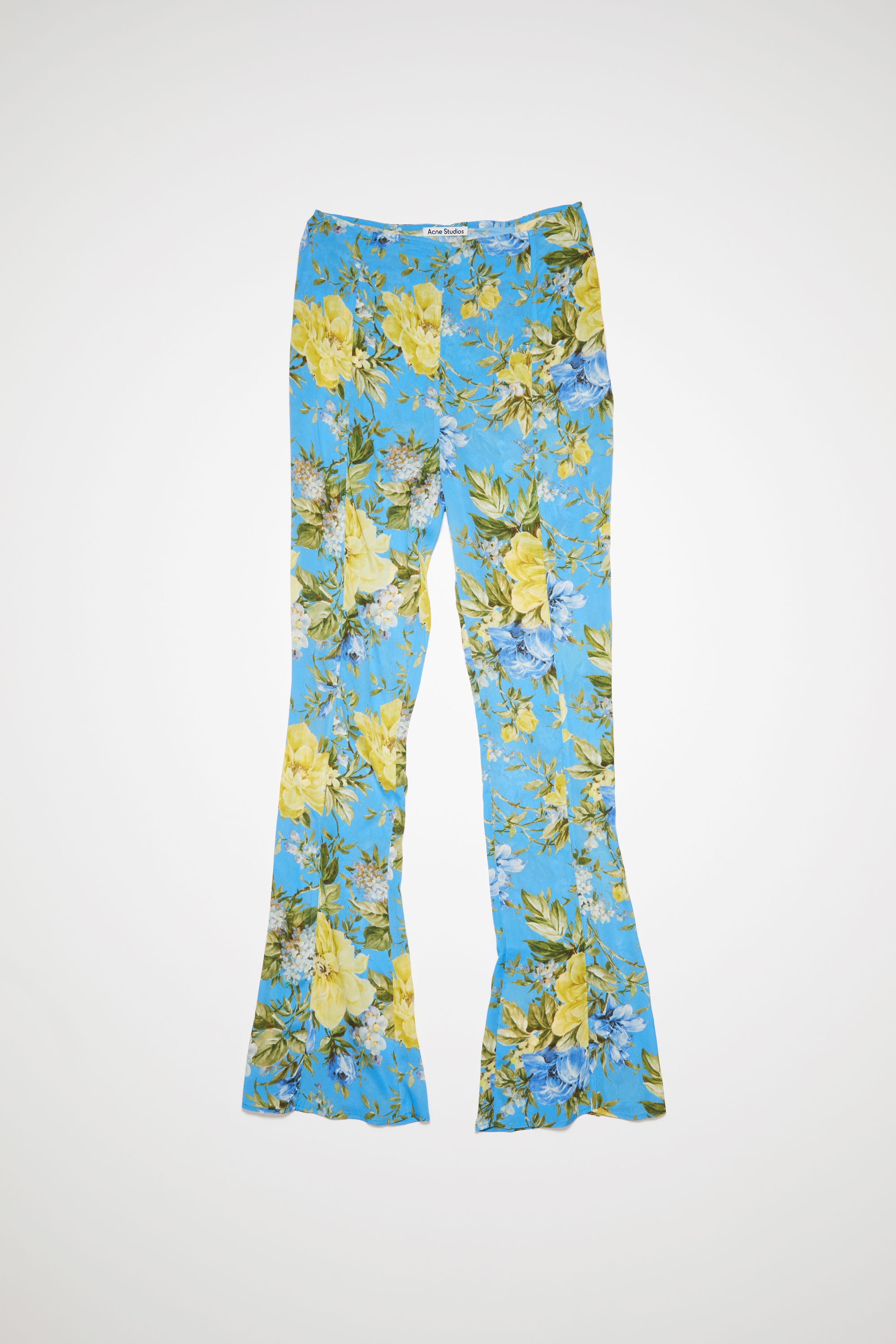 Acne Studios Flower print flared trousers - Blue | REVERSIBLE