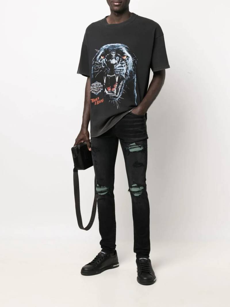 AMIRI ripped skinny jeans outlook