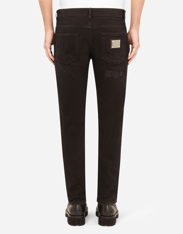 Black skinny stretch jeans with repaired rips - 2