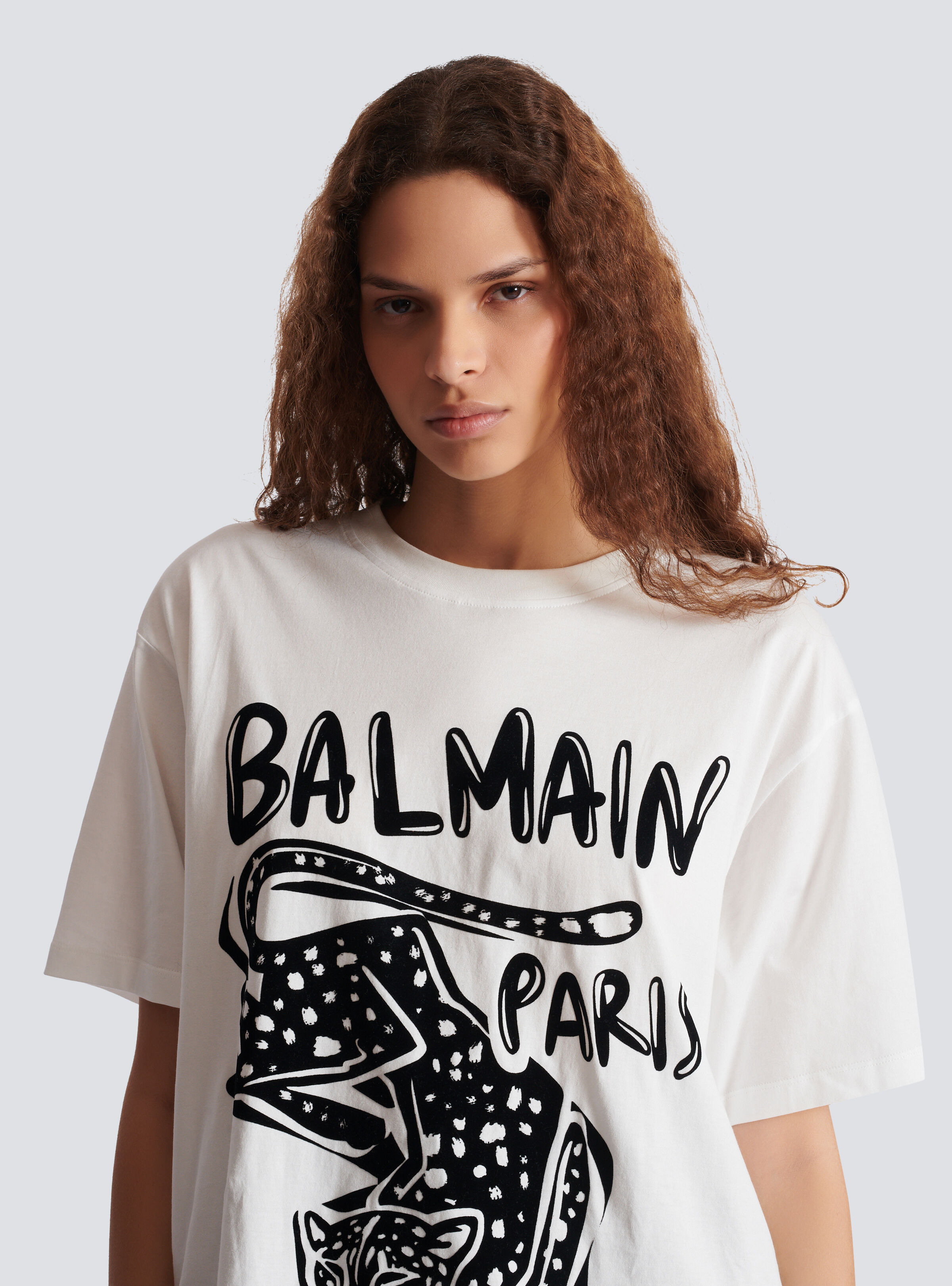 Short-sleeved T-shirt with leopard print - 7