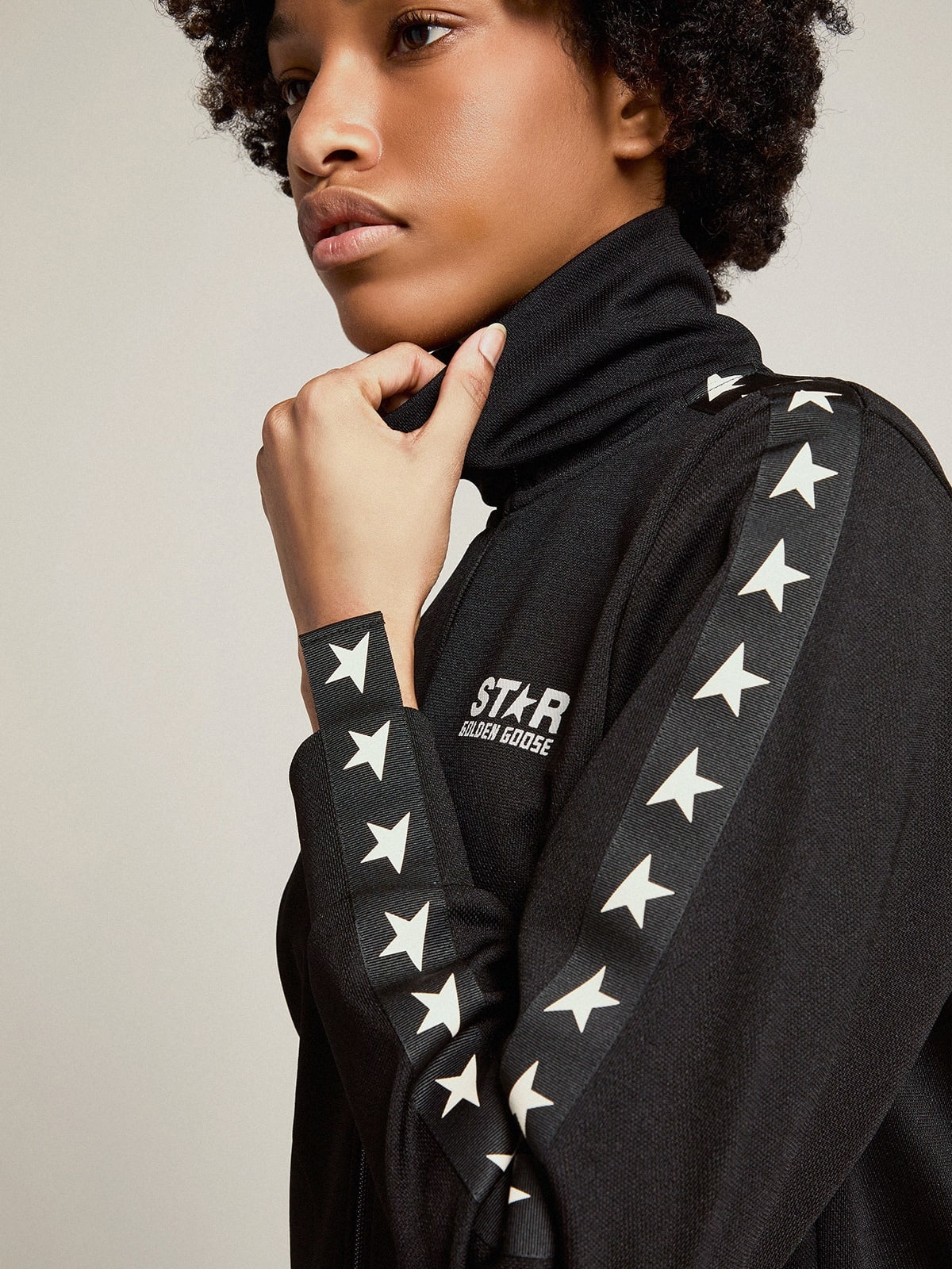 Women’s black zipped sweatshirt with white stars - 2