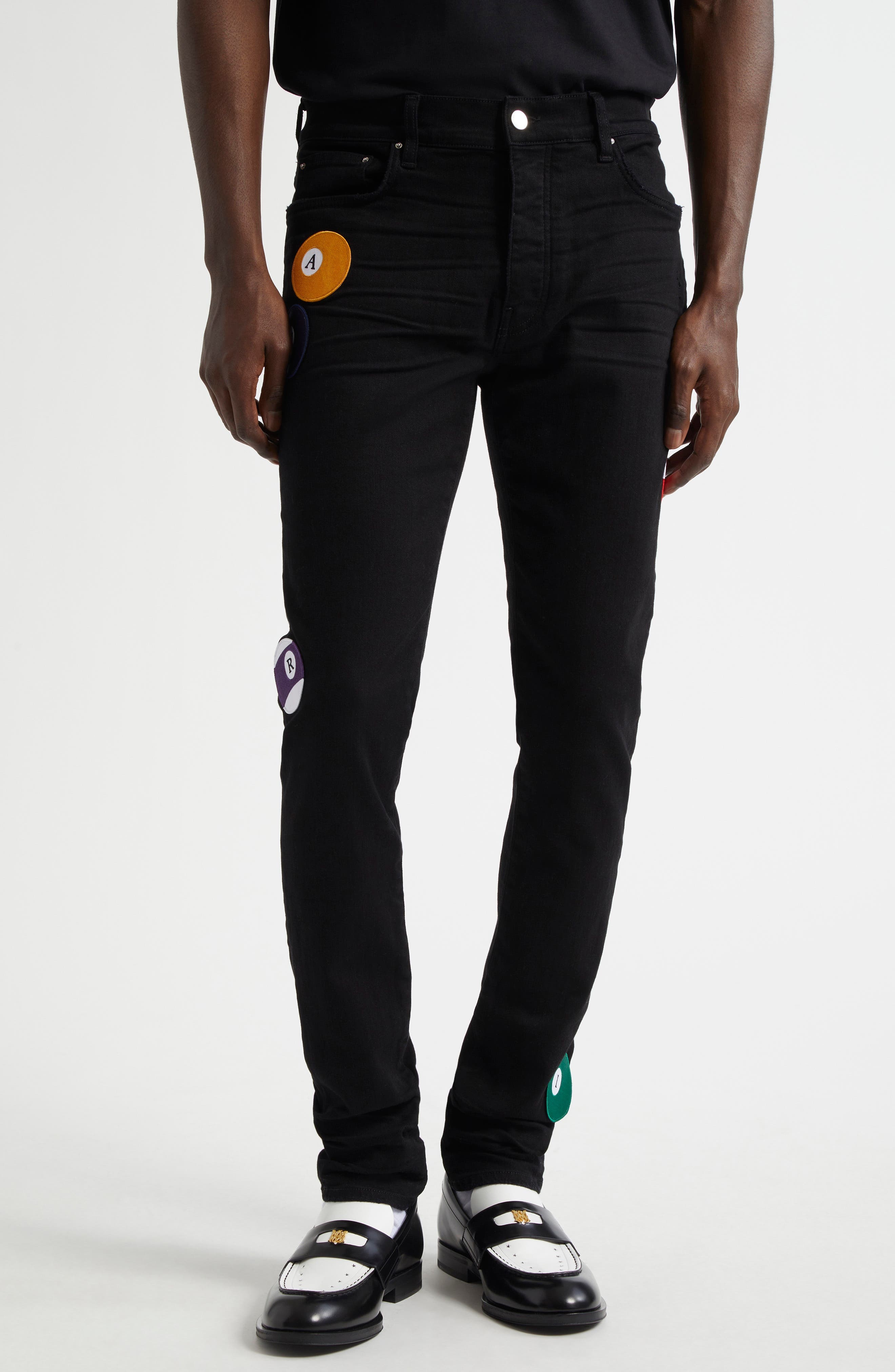 AMIRI Pool Ball Patch Skinny Jeans in Black at Nordstrom - 1