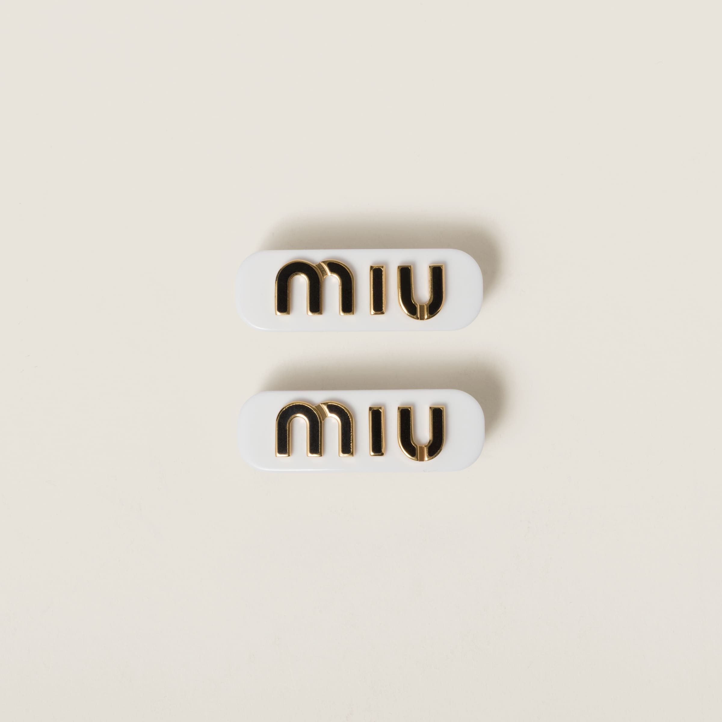Plexiglas and metal hair clips - 1