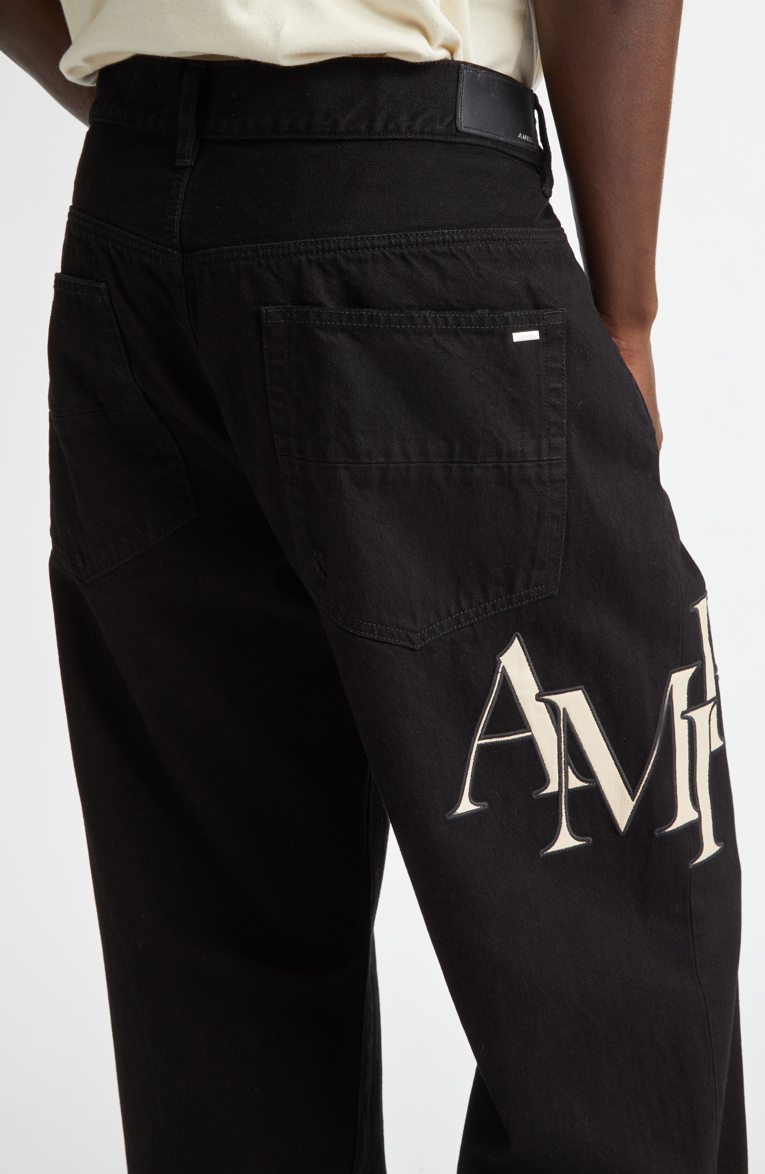 AMIRI Staggered Logo Nonstretch Denim Straight Leg Jeans in Black Od at Nordstrom - 5