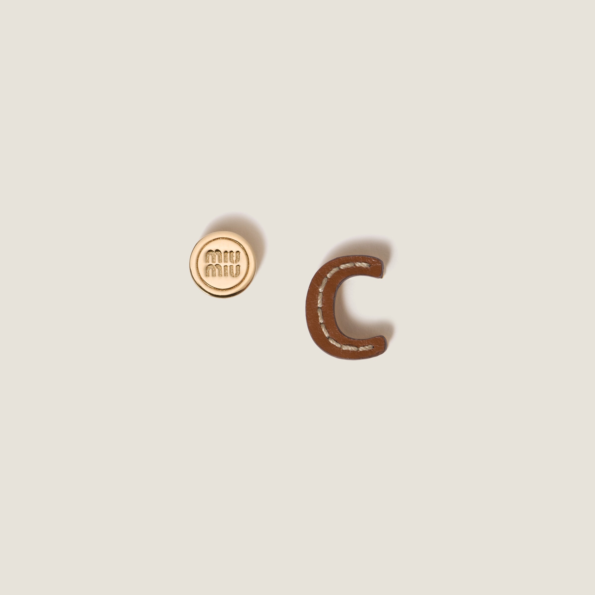 Leather and metal earrings - 1