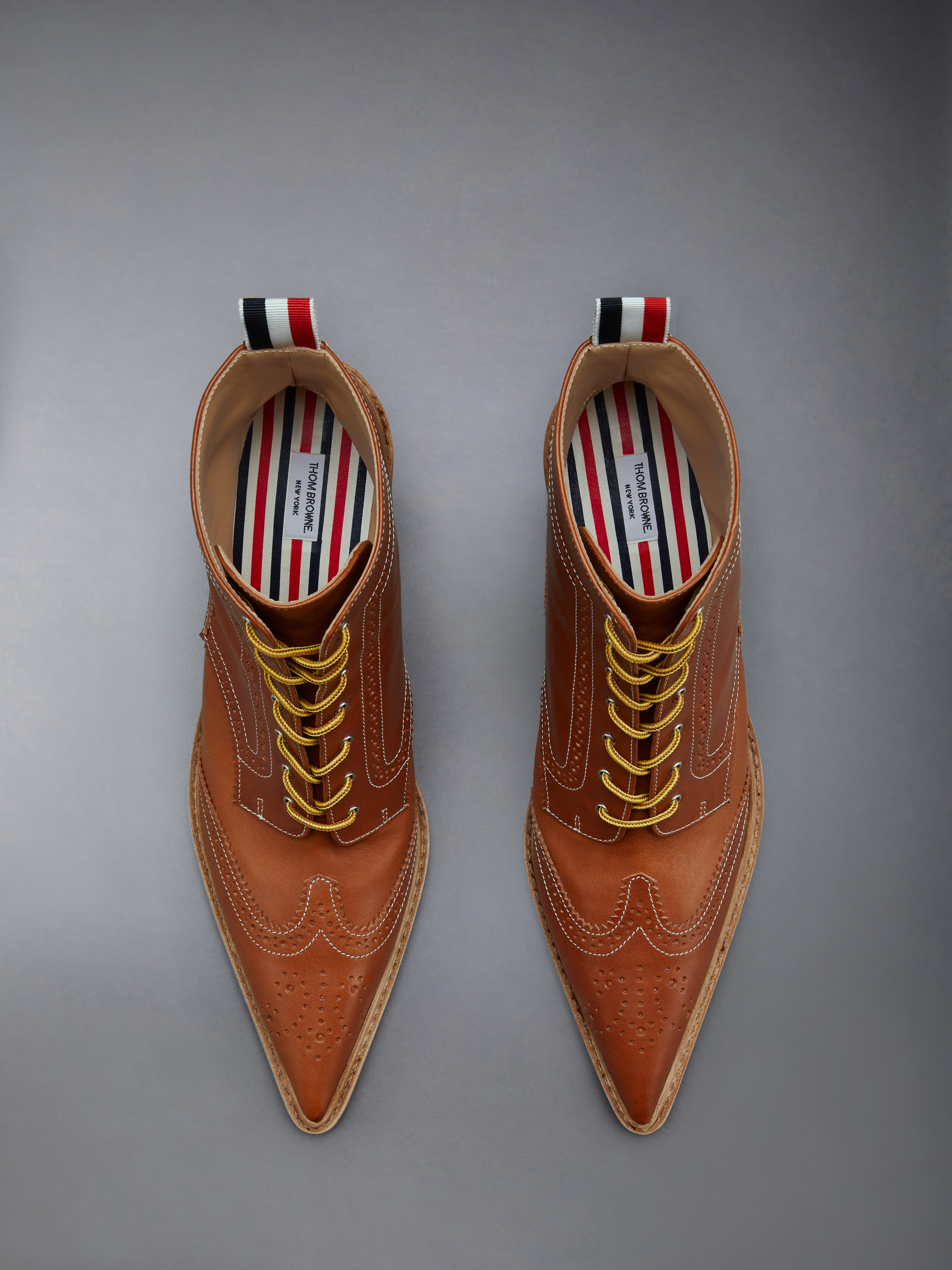 VACCHETTA WINGTIP CURVED HEEL BOOT - 5