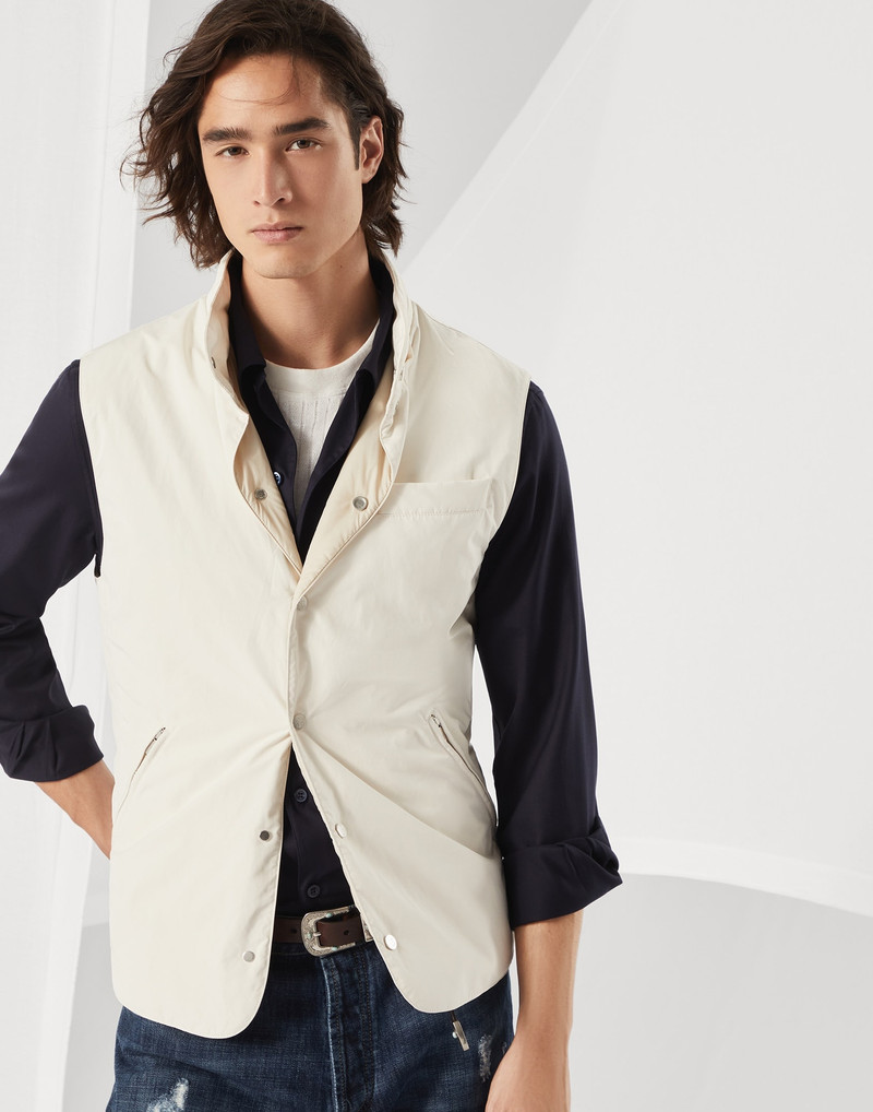 Water-resistant microfiber vest with Thermore® padding and detachable hood 1