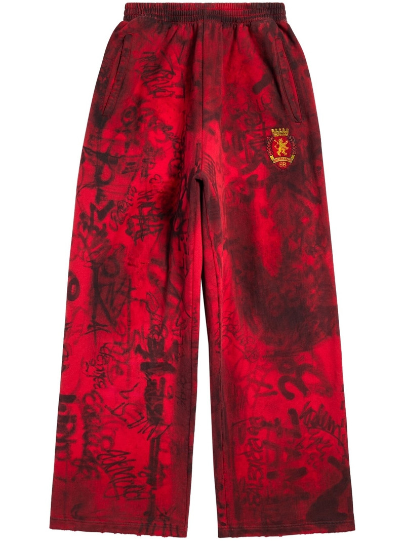 Graffiti Crest cotton track pants - 1