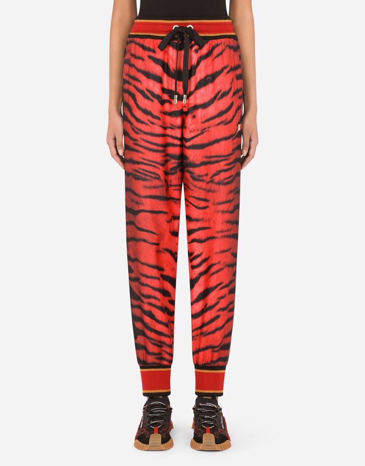 Tiger-print twill pants with ankle cuffs - 1