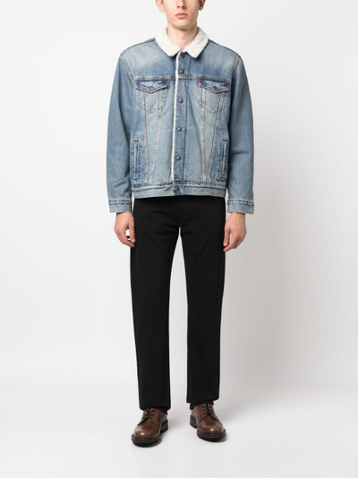 Levi's mid-rise straight-leg jeans outlook