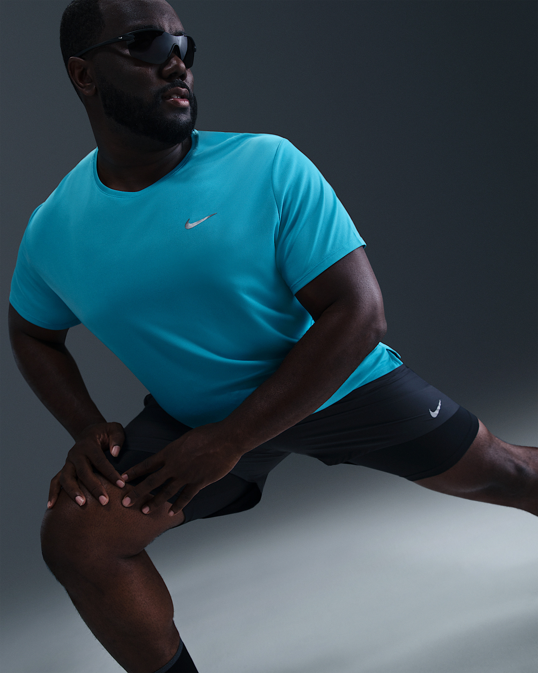 Nike Miler Men's Dri-FIT UV Short-Sleeve Running Top - 10