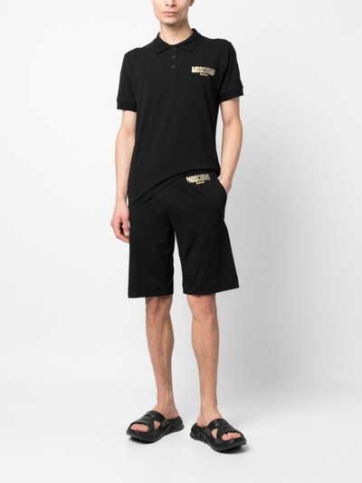 Moschino logo-print rhinestone-embellished track shorts outlook