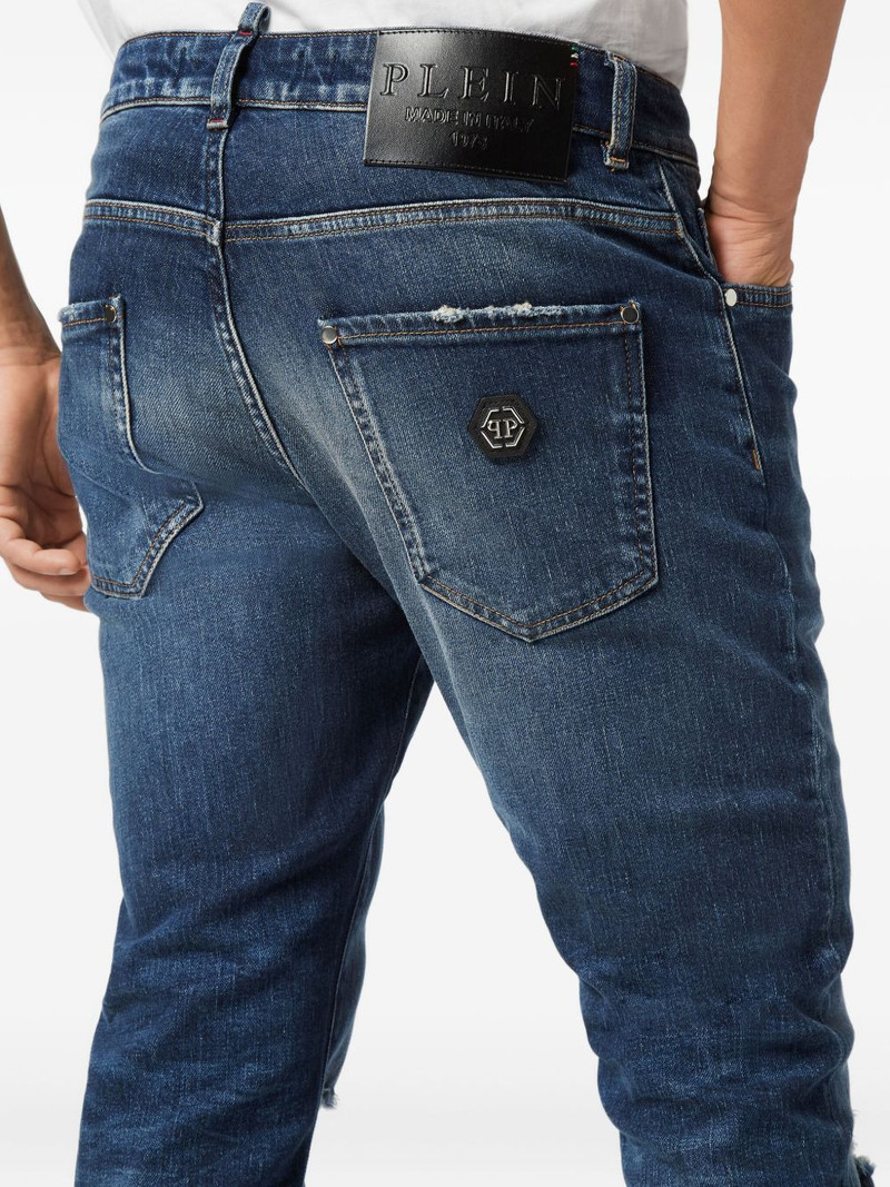 distressed logo-plaque jeans 4