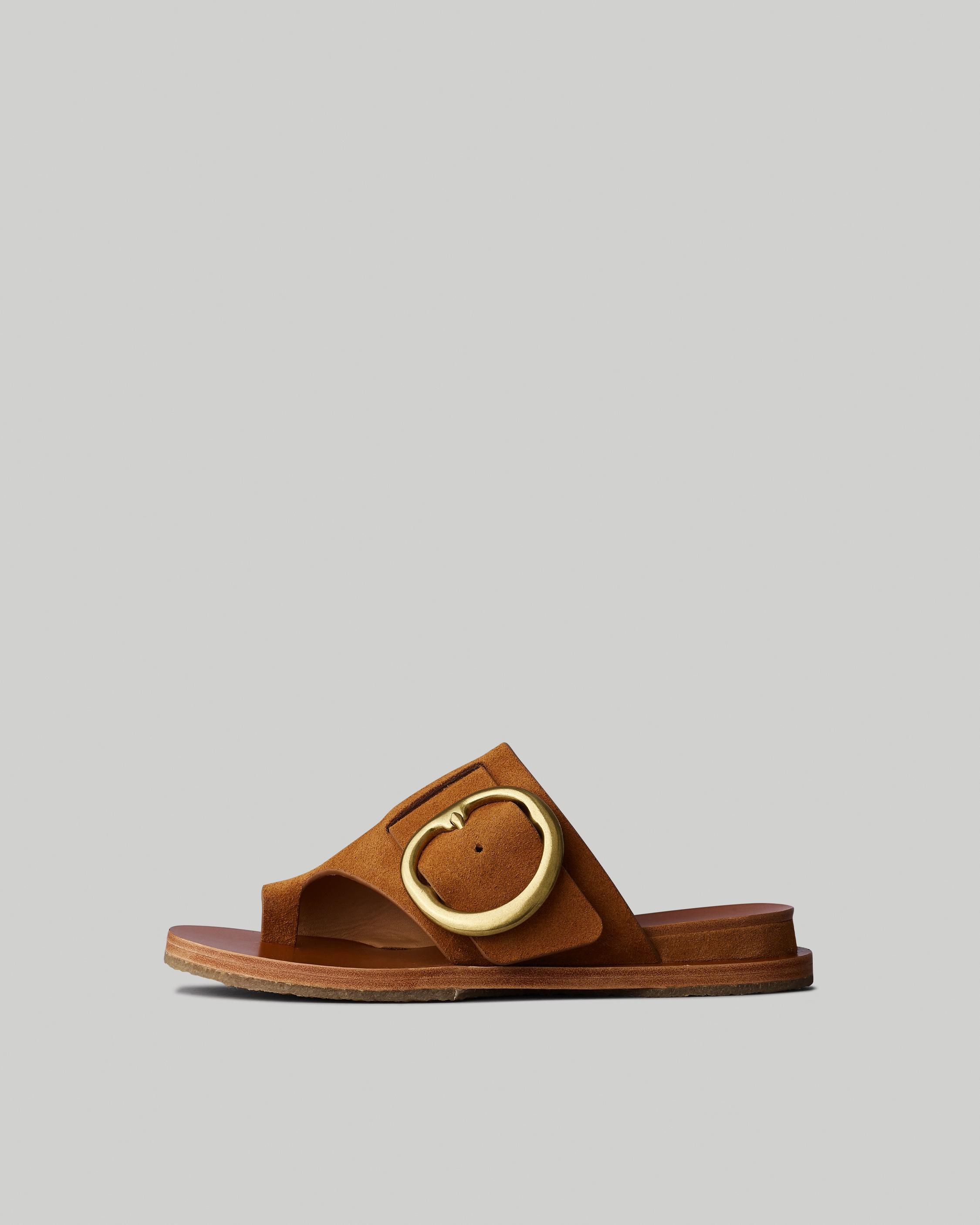 Beau Buckle Slide - Suede
Flat Sandal - 1